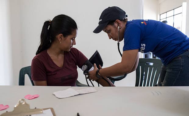 A patient receives treatment at the Americares medical clinic in Maicao, Colombia. 