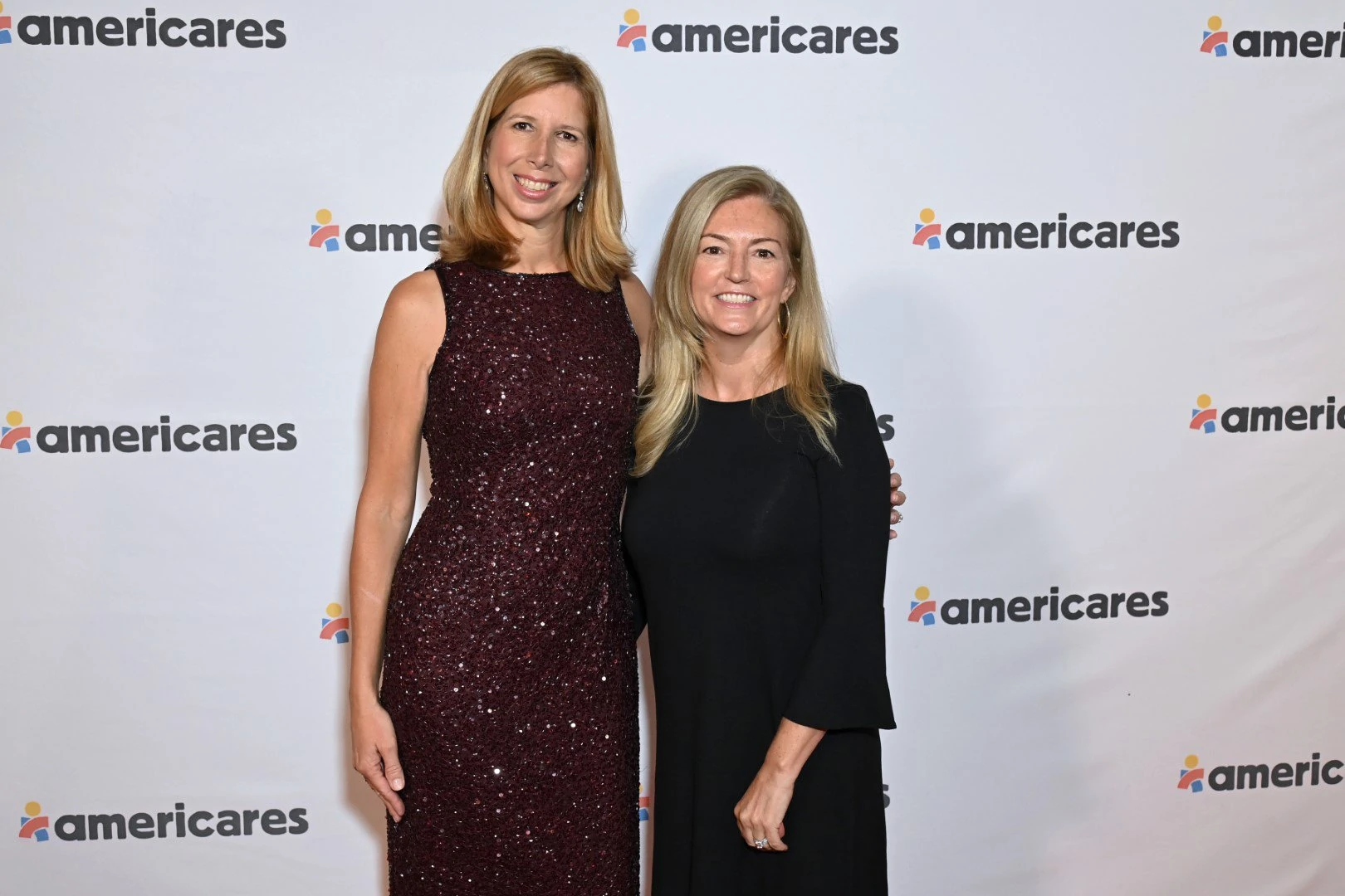 Americares President and CEO Christine Squires and Americares Board Chair Susan Grossman attend the 2022 Americares Airlift Benefit at Westchester County Airport on October 1, 2022 in Harrison, New York. Photo by Bryan Bedder/Getty Images for Americares.