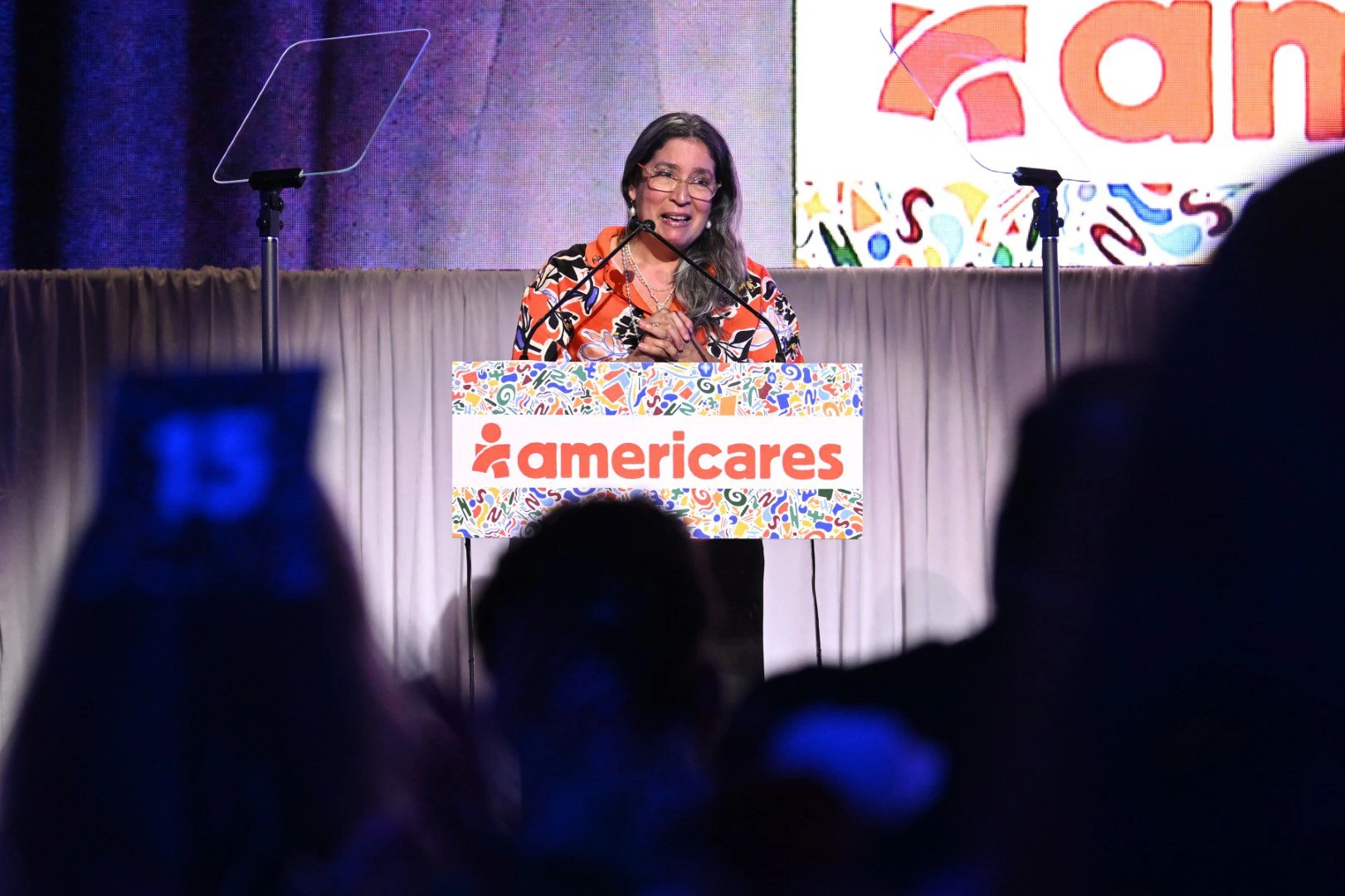 Americares Senior Director of Latin America and Caribbean Programs Dr. Brenda Rivera-García speaks onstage at the 2022 Americares Airlift Benefit at Westchester County Airport on October 1, 2022 in Harrison, New York. Photo by Bryan Bedder/Getty Images for Americares.