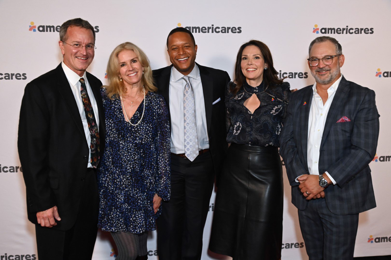 Event Co-Chairs Eric and Joy Weintz and Erica Hill and David Yount with News Anchor, NBC News’ “TODAY” and Co-Host, “3rd Hour of TODAY” and Master of Ceremonies Craig Melvin at the 2022 Americares Airlift Benefit at Westchester County Airport on October 1, 2022. Photo by Bryan Bedder/Getty Images for Americares.