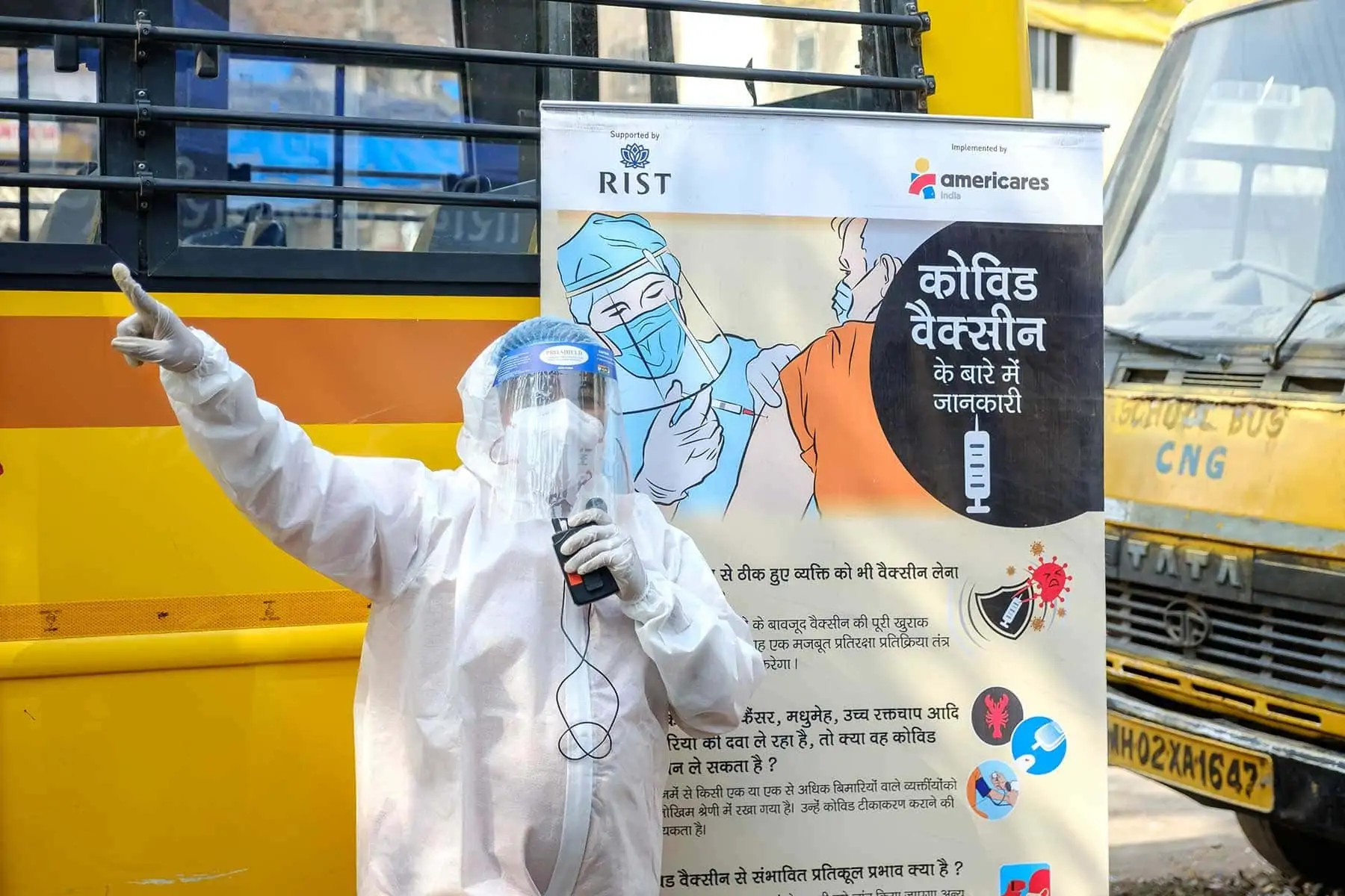 An Americares India staff member educates community members in Mumbai about the importance of COVID-19 vaccination in March. Photo courtesy of Americares India