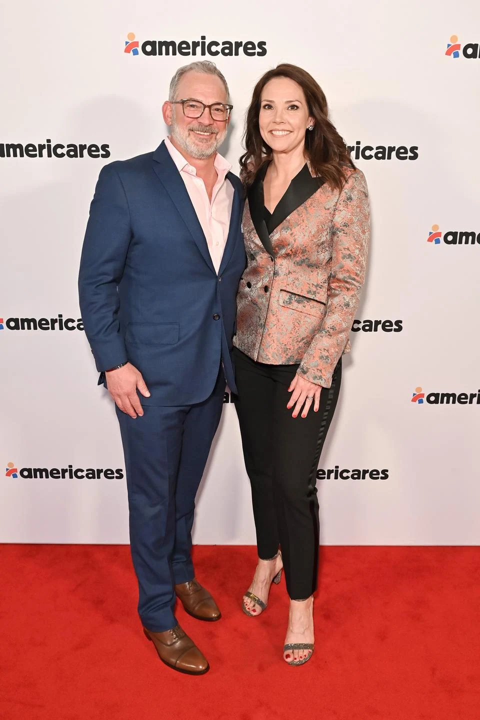 Americares Board Member and CNN Anchor and National Correspondent Erica Hill and David Yount at the 2024 Americares Airlift Benefit. Photo by Bryan Bedder/Getty Images for Americares.