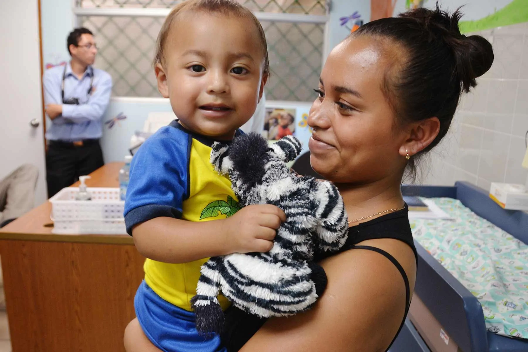 Mother and child at the El Salvador clinic