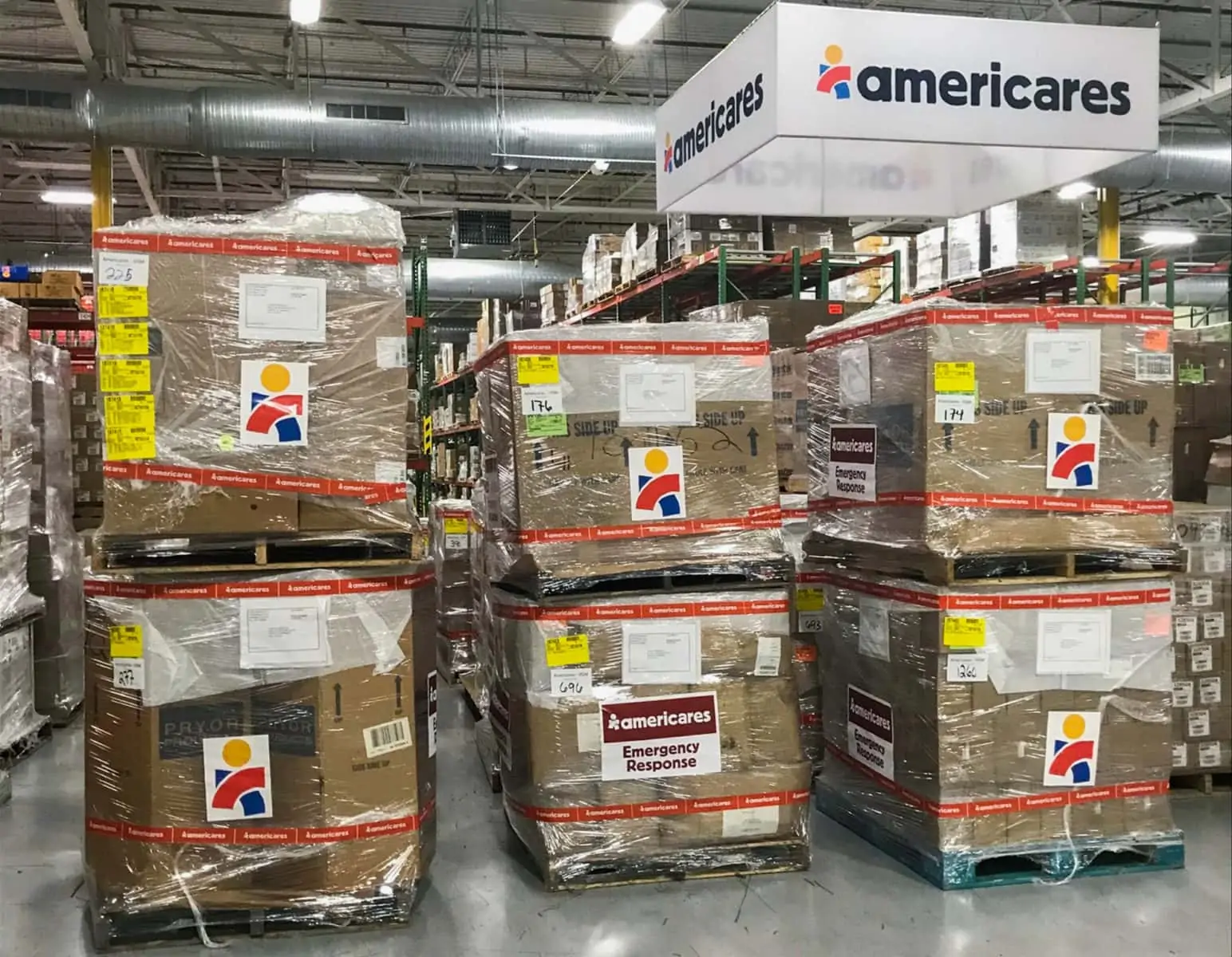 Staff of the Americares global distribution center in Stamford, Conn., prepare a series of aid shipments for Armenia. Photo by Juan Santana/Americares