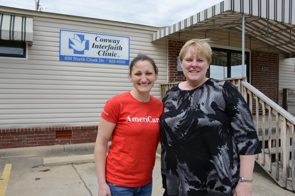 Kate with clinic partner in Arkansas after a tornado