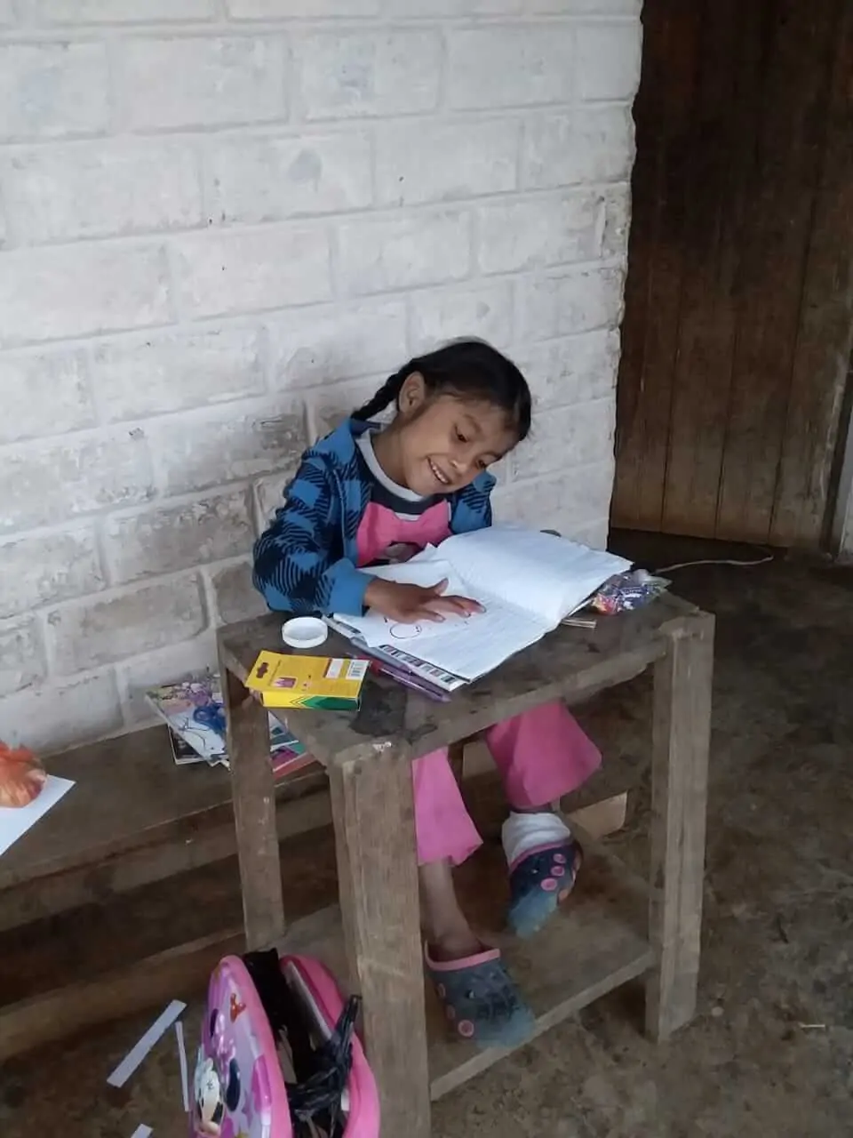 Photo of Alejandra studying